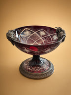 Vintage ruby red hand-cut crystal pedestal bowl with ornate bronze foliage mounts and classical base